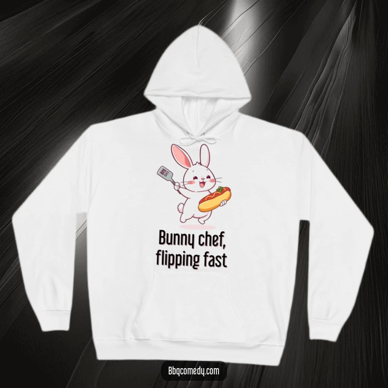 Bouncing bunny with a spatula flipping a tiny hot dog on a grill, cozying up in this funny hoodie.