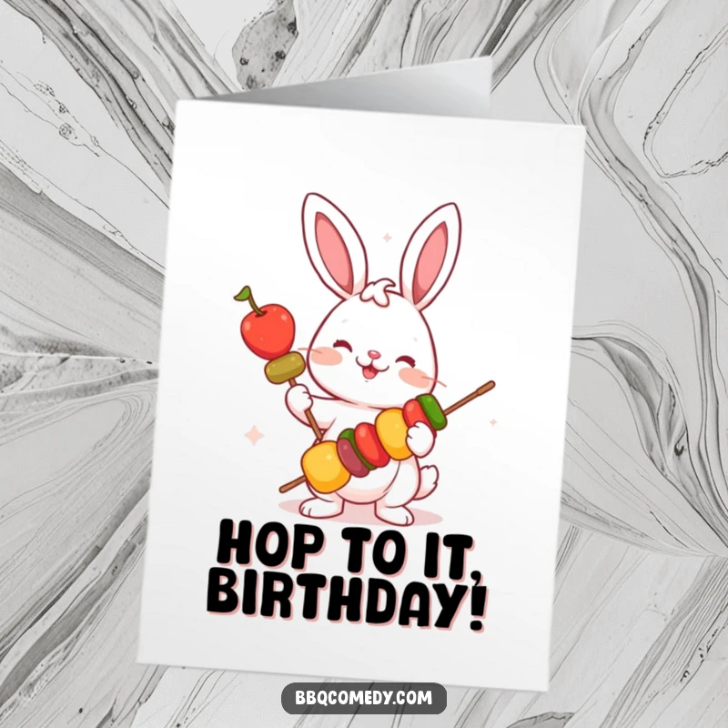 Funny free printable birthday card: a playful bunny holding a skewer of colorful vegetables, celebrating a birthday.