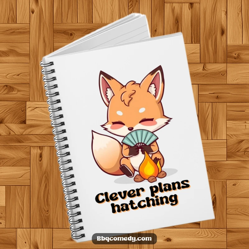 Funny determined fox fanning embers with a small fan, a lined notebook for jotting ideas with humor.